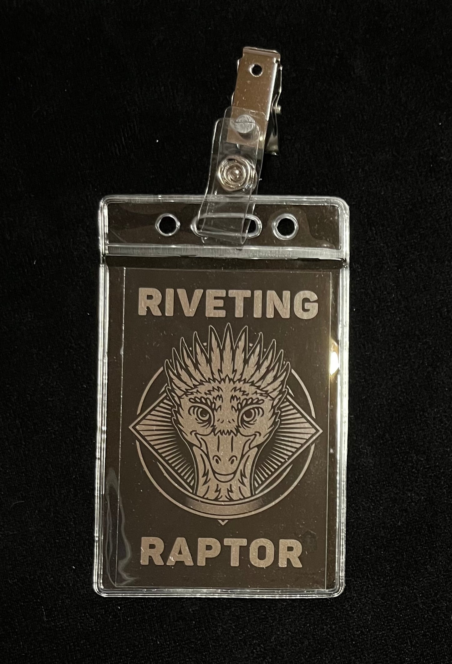 Riveting Raptor Badge