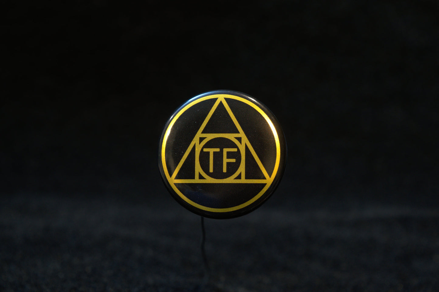 TF Furs Button Pin