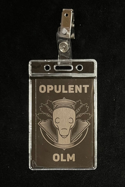 Opulent Olm Badge